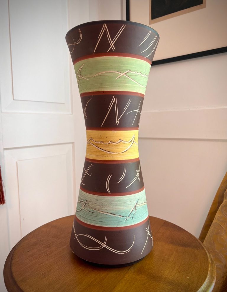 Mid-century ceramic vase with etched geometric bands and textured finish