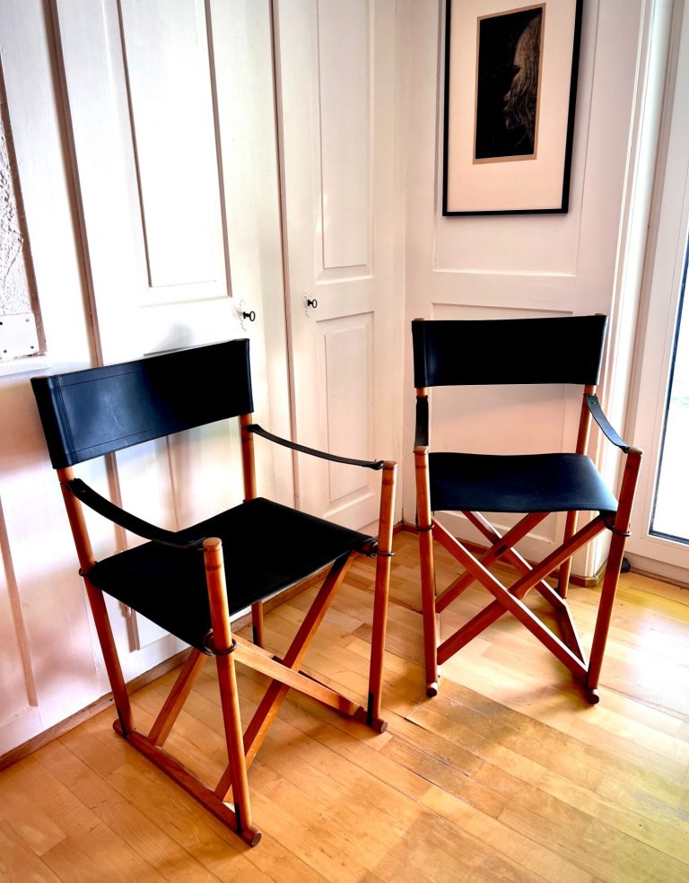 Pair of Mogens Koch MK-16 folding safari chairs in oiled beech and black leather, restored to original design