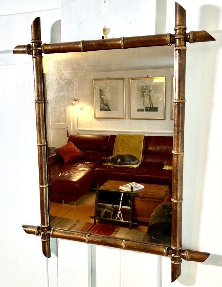 French Faux Bamboo Mirror – Circa 1910, Painted Wood with Original Glass Antique French wall mirror with painted faux bamboo wood frame and chinoiserie detailing, original clear glass, circa 1910